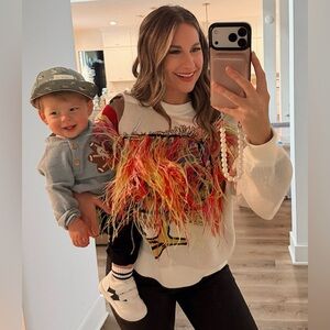 Queen of sparkles feather turkey sweater size medium worn once new condition